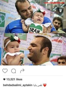فرزند بهداد سلیمی در آغوش پدر